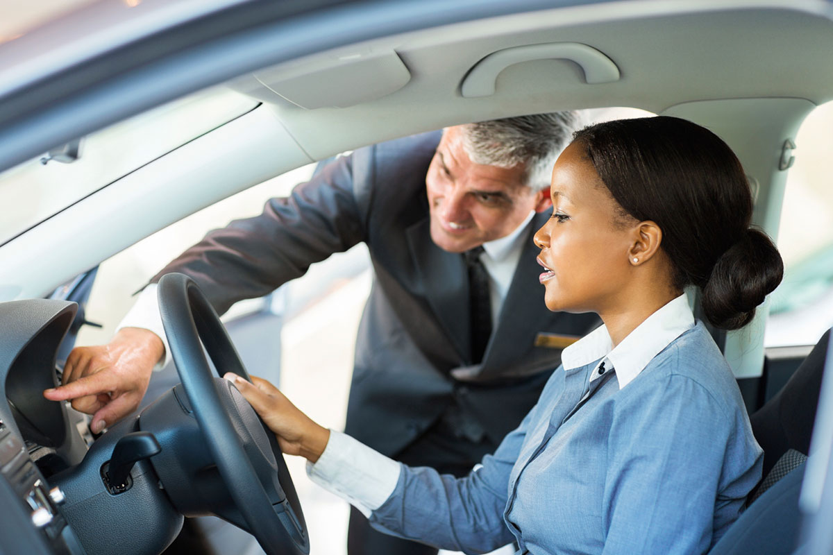 Woman shopping for a new car